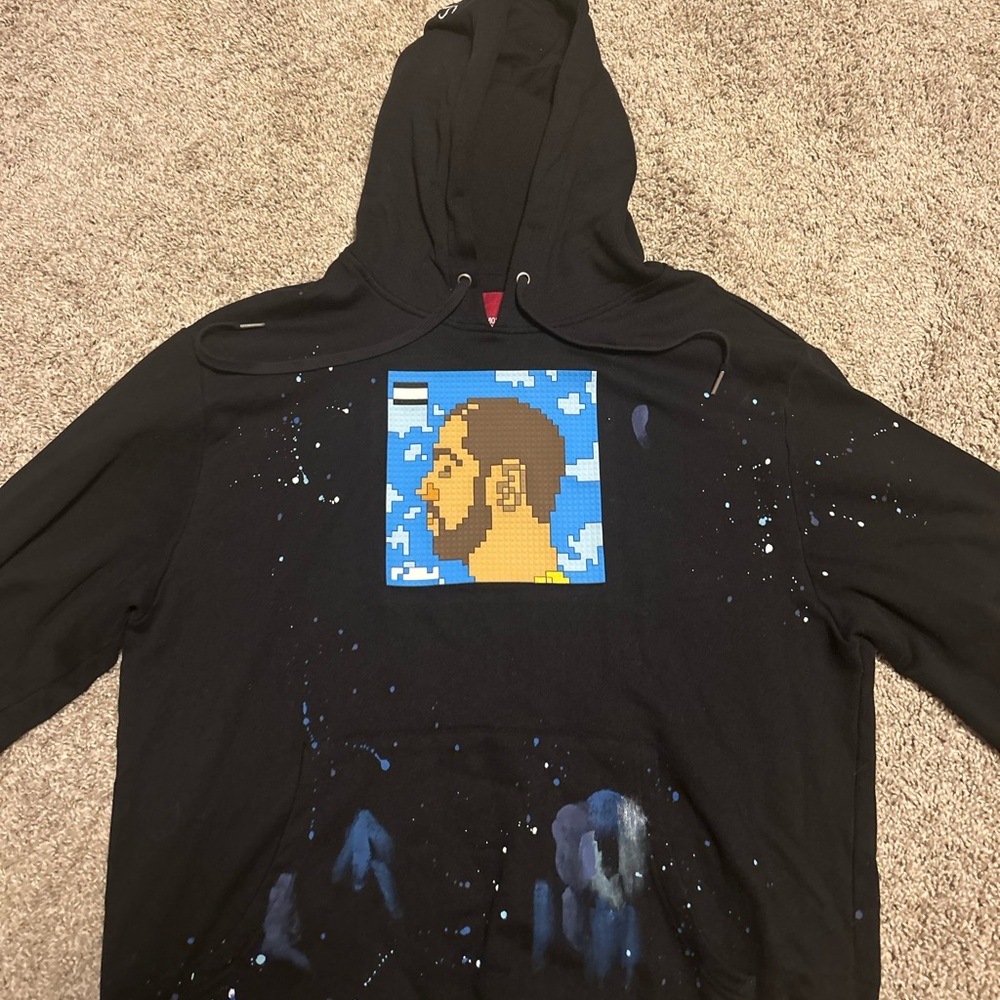 8-bit Mostly Heard Rarely Seen Drake hoodie with NFT included.